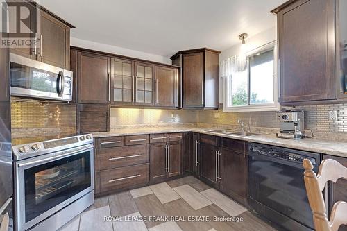 12 Glenabbey Drive, Clarington (Courtice), ON - Indoor Photo Showing Kitchen With Double Sink