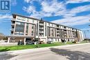 14400 Tecumseh Road East Unit# 213, Tecumseh, ON  - Outdoor With Balcony With Facade 