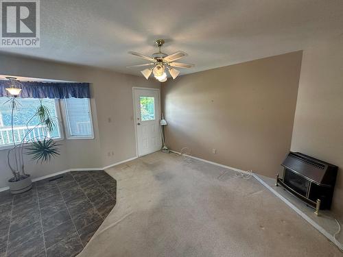 4405 Crystal Drive, Vernon, BC - Indoor Photo Showing Other Room With Fireplace