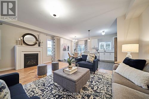 1202 Peelar Crescent, Innisfil (Lefroy), ON - Indoor Photo Showing Living Room With Fireplace