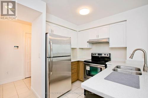 2001 - 50 Brian Harrison Way, Toronto (Bendale), ON - Indoor Photo Showing Kitchen With Double Sink With Upgraded Kitchen