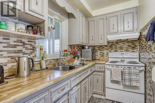 26 Ashwick Drive, Toronto (Clairlea-Birchmount), ON - Indoor Photo Showing Kitchen With Double Sink