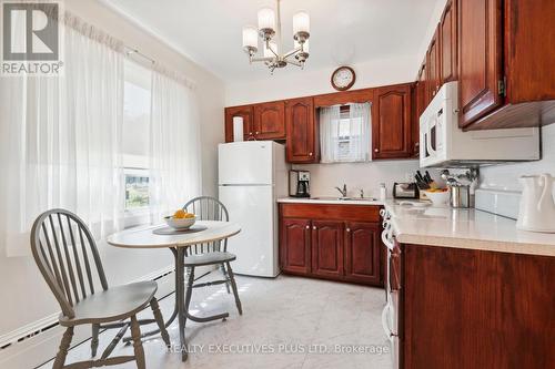 90 Spears Street, Toronto (Rockcliffe-Smythe), ON - Indoor Photo Showing Kitchen With Double Sink