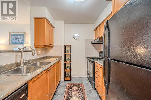 802 - 710 Humberwood Boulevard, Toronto (West Humber-Clairville), ON - Indoor Photo Showing Kitchen With Double Sink