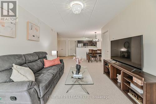 214 - 1460 Main Street E, Milton (Dempsey), ON - Indoor Photo Showing Living Room