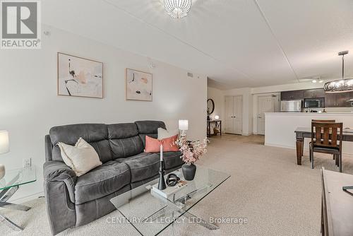 214 - 1460 Main Street E, Milton (Dempsey), ON - Indoor Photo Showing Living Room