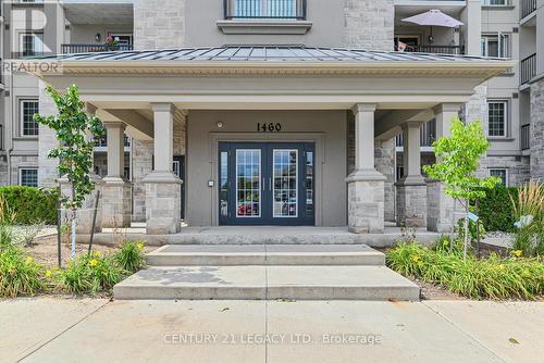 214 - 1460 Main Street E, Milton (Dempsey), ON - Outdoor With Balcony With Facade