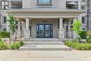 214 - 1460 Main Street E, Milton (Dempsey), ON  - Outdoor With Balcony With Facade 