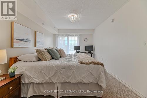 214 - 1460 Main Street E, Milton (Dempsey), ON - Indoor Photo Showing Bedroom