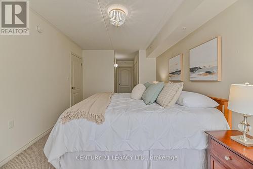 214 - 1460 Main Street E, Milton (Dempsey), ON - Indoor Photo Showing Bedroom