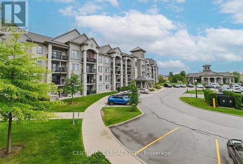 214 - 1460 Main Street E, Milton (Dempsey), ON - Outdoor With Facade