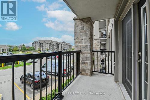 214 - 1460 Main Street E, Milton (Dempsey), ON - Outdoor With Balcony With Exterior