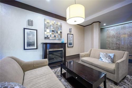 67 Caroline Street S|Unit #1801, Hamilton, ON - Indoor Photo Showing Living Room With Fireplace