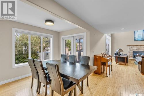 422 Beechmont Place, Saskatoon, SK - Indoor Photo Showing Dining Room With Fireplace