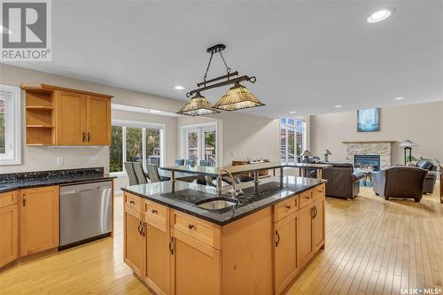 422 Beechmont Place, Saskatoon, SK - Indoor Photo Showing Kitchen With Fireplace