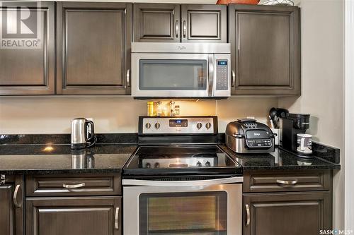 217 100 Chaparral Boulevard, Martensville, SK - Indoor Photo Showing Kitchen With Stainless Steel Kitchen