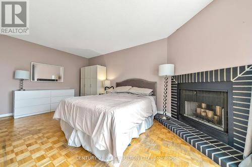 26 Harvest Moon Drive, Toronto (Rouge), ON - Indoor Photo Showing Bedroom With Fireplace