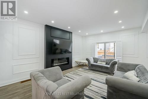 50 Alaskan Heights, Barrie, ON - Indoor Photo Showing Living Room With Fireplace