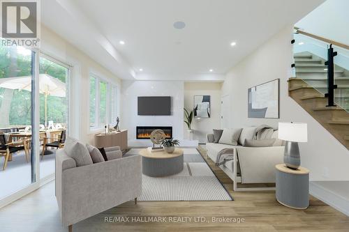 77 Natal Avenue, Toronto (Birchcliffe-Cliffside), ON - Indoor Photo Showing Living Room With Fireplace