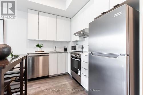 210 - 120 Canon Jackson Drive, Toronto (Beechborough-Greenbrook), ON - Indoor Photo Showing Kitchen With Stainless Steel Kitchen