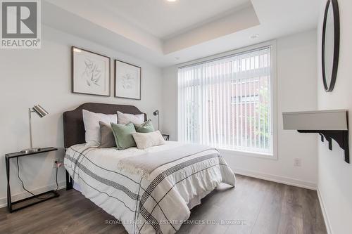 210 - 120 Canon Jackson Drive, Toronto (Beechborough-Greenbrook), ON - Indoor Photo Showing Bedroom