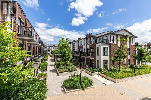 210 - 120 Canon Jackson Drive, Toronto (Beechborough-Greenbrook), ON - Outdoor With Balcony With Facade