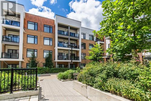 210 - 120 Canon Jackson Drive, Toronto (Beechborough-Greenbrook), ON - Outdoor With Balcony With Facade