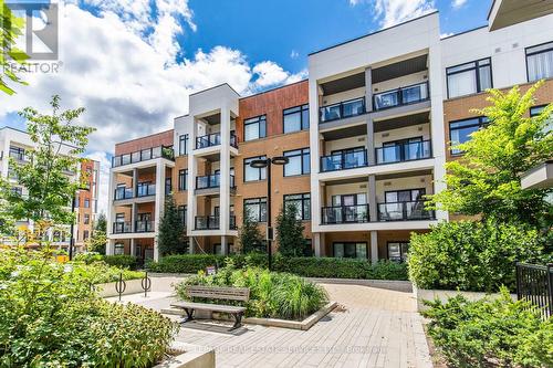 210 - 120 Canon Jackson Drive, Toronto (Beechborough-Greenbrook), ON - Outdoor With Balcony With Facade