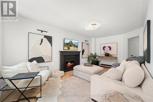 10 Kenwell Crescent, Barrie (Holly), ON - Indoor Photo Showing Living Room With Fireplace