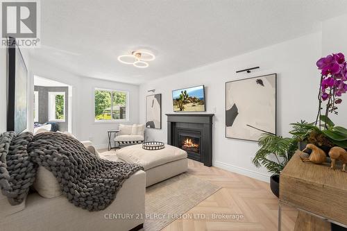 10 Kenwell Crescent, Barrie (Holly), ON - Indoor Photo Showing Living Room With Fireplace