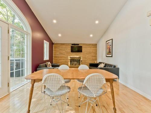 Dining room - 68 Rue Des Outardes, Eastman, QC - Indoor Photo Showing Other Room With Fireplace