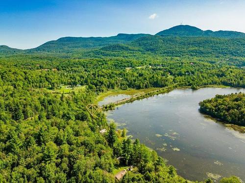 Photo aÃ©rienne - 68 Rue Des Outardes, Eastman, QC - Outdoor With Body Of Water With View