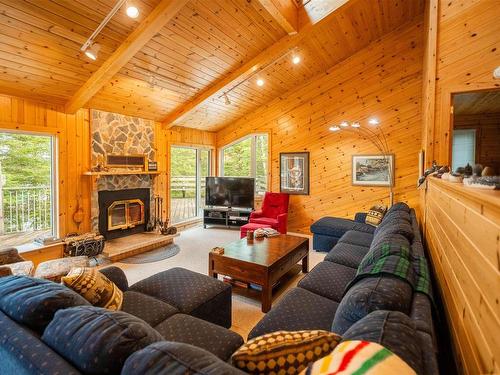 4 Lily Pad Bay, District Of Kenora, ON - Indoor Photo Showing Living Room With Fireplace