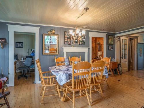 Dining room - 6620 175E Rue, Saint-Georges, QC - Indoor Photo Showing Dining Room With Fireplace