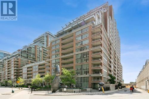 701 - 85 East Liberty Street, Toronto (Niagara), ON - Outdoor With Balcony With Facade