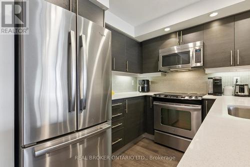 701 - 85 East Liberty Street, Toronto (Niagara), ON - Indoor Photo Showing Kitchen With Stainless Steel Kitchen With Upgraded Kitchen