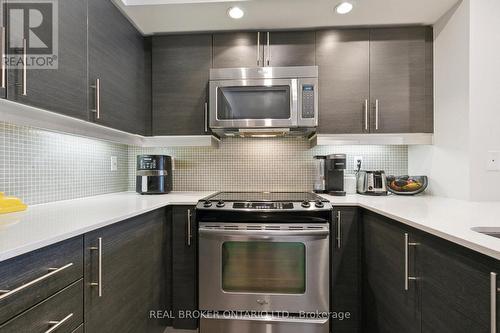 701 - 85 East Liberty Street, Toronto (Niagara), ON - Indoor Photo Showing Kitchen With Upgraded Kitchen