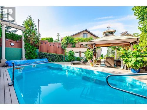 375 Trumpeter Court, Kelowna, BC - Outdoor With In Ground Pool With Backyard