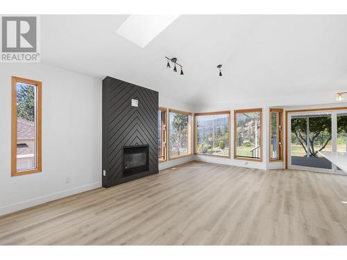 3898 Desert Pines Avenue, Peachland, BC - Indoor Photo Showing Other Room With Fireplace