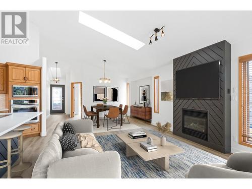 3898 Desert Pines Avenue, Peachland, BC - Indoor Photo Showing Living Room With Fireplace