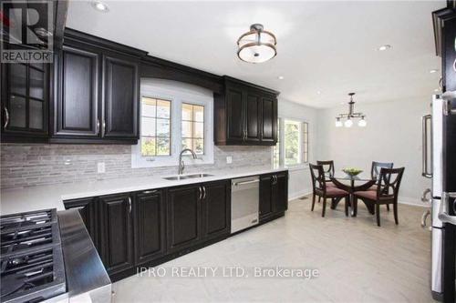 10414 Chinguacousy Road, Brampton (Fletcher'S Meadow), ON - Indoor Photo Showing Kitchen With Double Sink