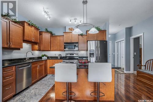 305 405 Cartwright Street, Saskatoon, SK - Indoor Photo Showing Kitchen With Double Sink