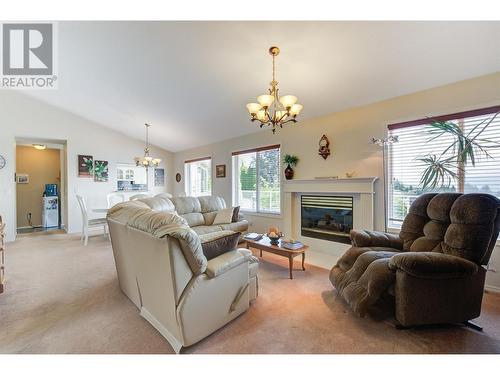 3131 Doucette Drive, West Kelowna, BC - Indoor Photo Showing Living Room With Fireplace