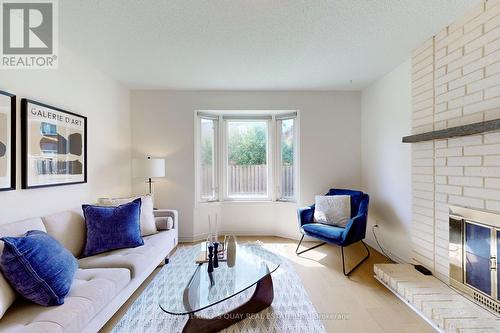 125 Wharton Square, Toronto (Milliken), ON - Indoor Photo Showing Living Room With Fireplace