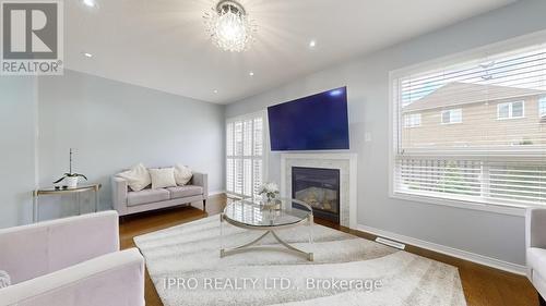 3210 Cabano Crescent, Mississauga (Churchill Meadows), ON - Indoor Photo Showing Living Room With Fireplace