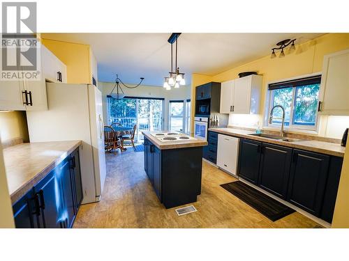 4101 & 4107 Santa Road, Scotch Creek, BC - Indoor Photo Showing Kitchen With Double Sink