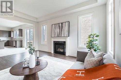 77 Pondview Gate, Hamilton (Waterdown), ON - Indoor Photo Showing Living Room With Fireplace