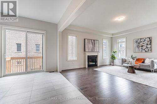 77 Pondview Gate, Hamilton (Waterdown), ON - Indoor Photo Showing Living Room With Fireplace