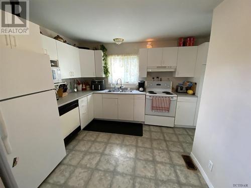 14 Wishman St, Kirkland Lake, ON - Indoor Photo Showing Kitchen With Double Sink