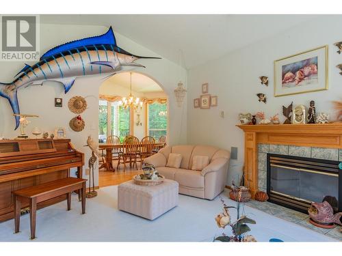 2718 Osachoff Road, South Slocan, BC - Indoor Photo Showing Living Room With Fireplace